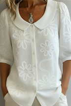 BLUSA FLORAL ELEGANTE