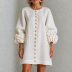 LOLA | MINIVESTIDO CON ESTAMPADO FLORAL Y CIERRE DE BOTONES