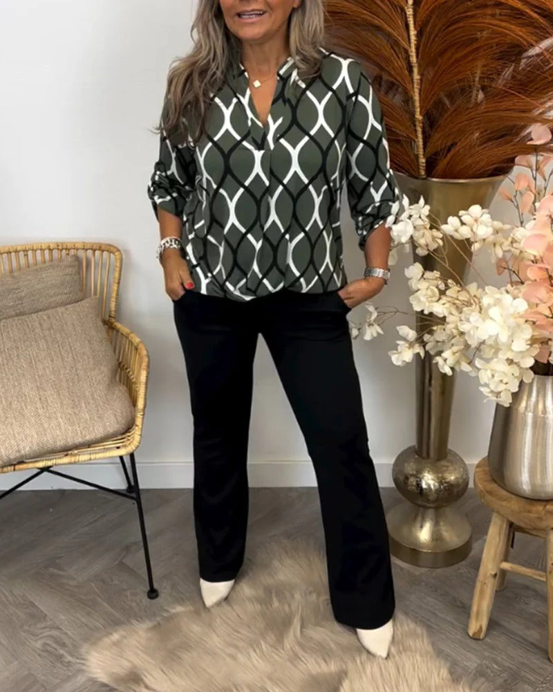 NORA | BLUSA FAVORECEDORA CON UN ELEGANTE ESTAMPADO