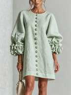 LOLA | MINIVESTIDO CON ESTAMPADO FLORAL Y CIERRE DE BOTONES